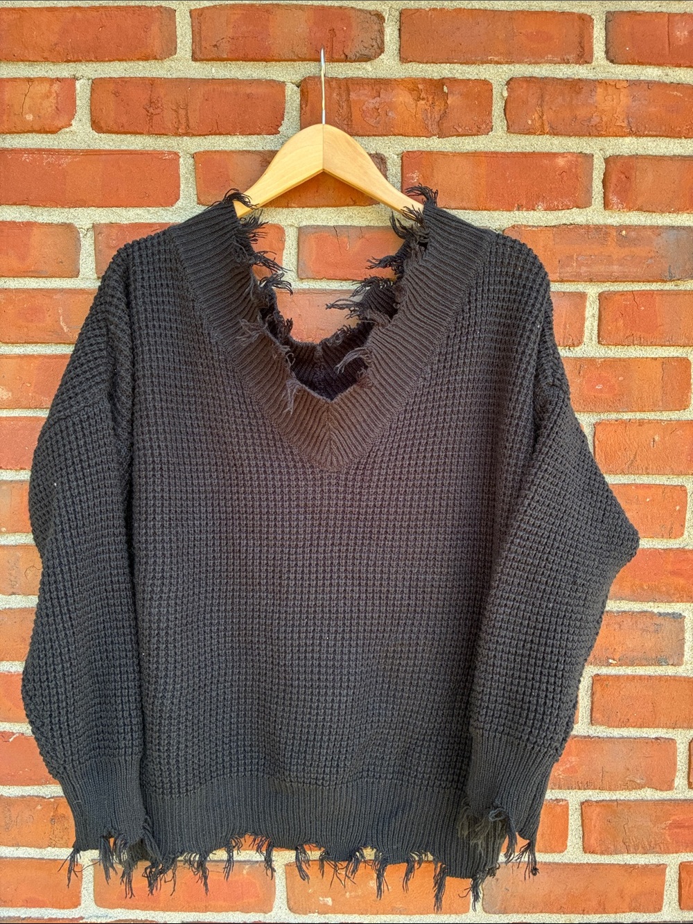 Zenana Outfitters Black Distressed V‑Neck Waffle Knit Sweater
